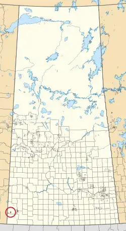A map of the province of Saskatchewan showing 297 rural municipalities and hundreds of small Indian reserves. One is highlighted with a red circle.