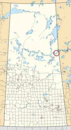 A map of the province of Saskatchewan showing 297 rural municipalities and hundreds of small Indian reserves. One is highlighted with a red circle.