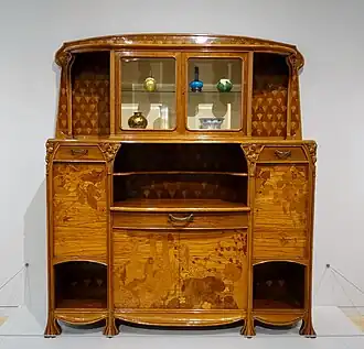 Cabinet by Louis Majorelle, with glass vases by Louis Comfort Tiffany (1900–1910), (Dallas Museum of Art)