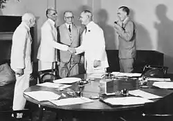 Members of the 1946 Cabinet Mission to India meeting Muhammad Ali Jinnah. Far left is Lord Pethick Lawrence; far right is Sir Stafford Cripps.