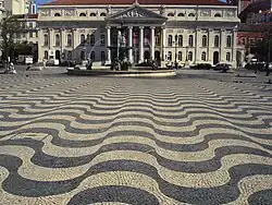 Portuguese pavement of black basalt and white limestone in Lisbon