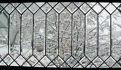 Many Victorian-style houses in the United States have decorative came glasswork windows with clear beveled glass panels