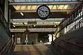 Carnforth railway station clock and ramp from subway under platforms