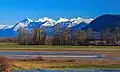 Cheam Range seen from the west near Chilliwack. L to R: Cheam, Lady, Knight (center), Baby Munday, Still, Welch.