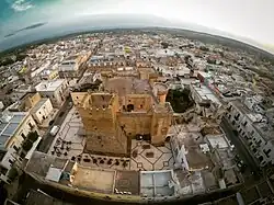 View of Pulsano with Falconibus Castle in the foreground