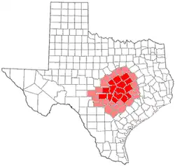Central Texas counties in red; counties sometimes included in Central Texas in pink
