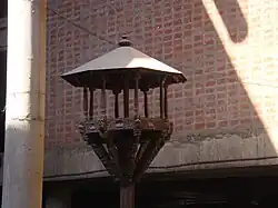 Chabutra and brick walls.