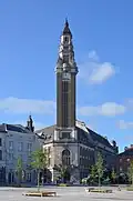 The belfry in front of the Place du Manège