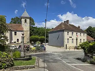 The fountain, the church and the townhall of Châtillon-le-Duc