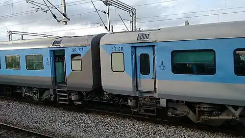 This Shatabdi Express entering Mysuru Junction captured from out going Mysuru–Tuticorin Express