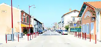 The main road in the village of Cheval-Blanc