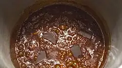 A sauce for chili stew prepared using whisky