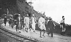 Chittaranjan Das with cane in hand, and Mahatma Gandhi on the Hill Cart Road near Kakjhora, Darjeeling in 1925