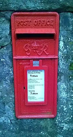 British Royal Mail GR VI Cast Iron Wall Post Box in Clackmannan, Scotland, and still in use