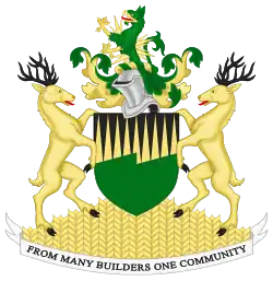 Arms of Melfort, Saskatchewan, with the compartment tapissé of wheat.