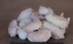 A pile of brownish slimy beans