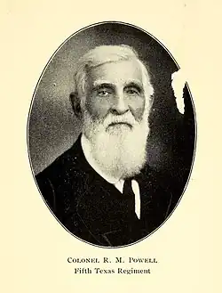 Sepia toned oval photo of an elderly whte-bearded man in civilian clothes