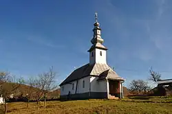 Archangels wooden church in Colești