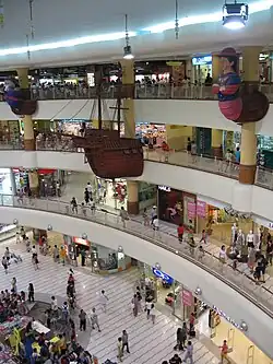 Wall mounts on the railings depicting the theme of the mall
