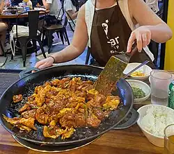 Cooking dakgalbi at the table at a restaurant in Seoul