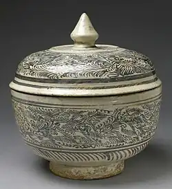 Image 5315th-16th century Sawankhalok stoneware with brown underglaze and pale blue glaze (from Culture of Thailand)