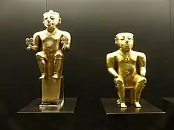 Two statues of caciques sitting on stools; Museum of the Americas (Madrid, Spain)