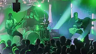 Dance with the Dead performing in 2023 (from left: Tony Kim, tour drummer John Terry, and Justin Pointer)