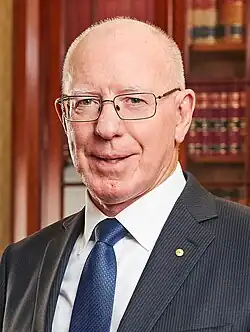 Head shot of Hurley smiling