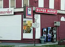Old N.Y. State Highway signs at the corner of Utica and Cortland streets (NYS Rt. 13), July 2001
