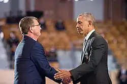 Secretary Carter awards President Obama with the medal during an Armed Forces full honor review farewell ceremony.