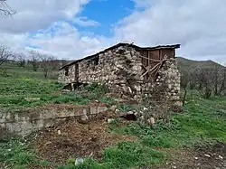 Destroyed house in the village