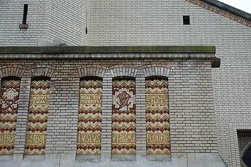 Mosaics and munticolor bricks decorating the facade