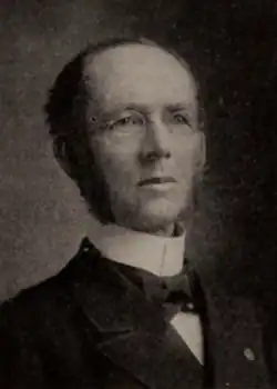 Black-and-white head shot of Sheffield