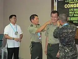UP Village Bgy Captain and Lawyer Virgilio S Ferrer II is promoted to the rank of major in the reserve force, Philippine Army.