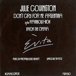 The song and artist name in white font against a dark blue background.