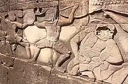 Weapons usage and double wrist lock at Bayon (12th/13th century)