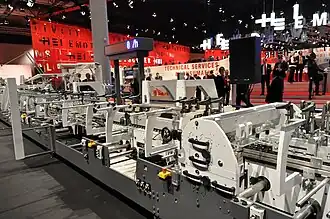 Folding carton gluing machines were built by Heidelberg until 2018 and have since been produced by Masterwork Machinery