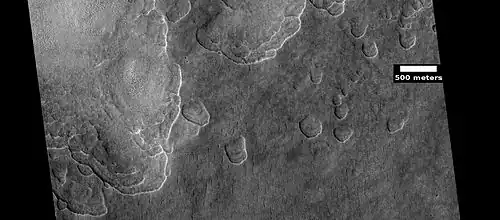 Scalloped ground, as seen by HiRISE under HiWish program.