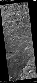 Wide view of layers in Crommelin crater, as seen by HiRISE. Parts of this photo are enlarged in following images.