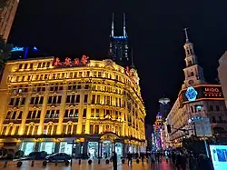 The Nanjing Pedestrian Street at night. This is a popular commercial center in Shanghai.