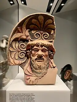 Etruscan palmettes on an antefix with a mascaron of Silenus, 4th century BC, ceramic, Neues Museum, Berlin