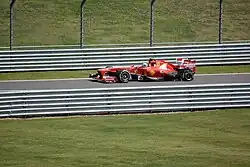 Felipe Massa driving to the pit lane