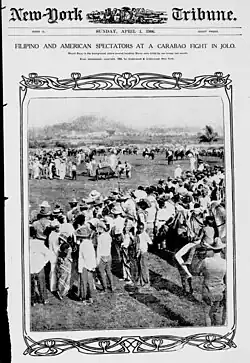 Filipinos and American soldiers observed a fight in 1906.
