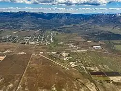 Aerial view of Fillmore, Fillmore Airport, and mountains