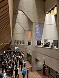 Lobby and mezzanine located within FirstOntario Concert Hall's atrium. The connection to the Hamilton Convention Centre is located in the lobby, and the exit to Commonwealth Square is located on the mezzanine level