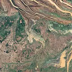 Satellite image of a river flooding.