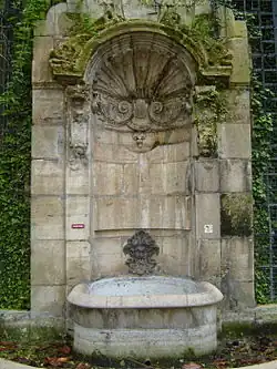 Fontaine de L'Abbaye de Saint-Germain-des-Pres, (1714-1717). It was moved in the 19th century to make room for the Boulevard Saint-Germain, and now is in Square Langevin, in the 5th arrondissement.