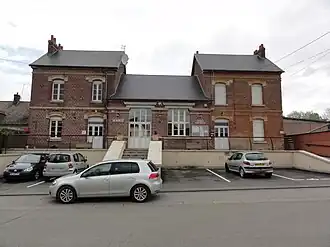 The town hall and school of Fourdrain