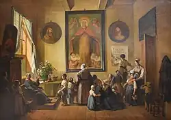 A group of women and children in a room. The children engage in various activities and appear to be in the care of the women.