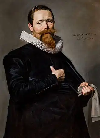 Portrait of a man with glove in left hand